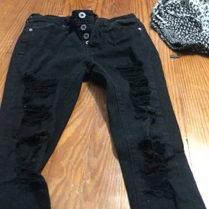 Ripped high waisted black skinny jeans